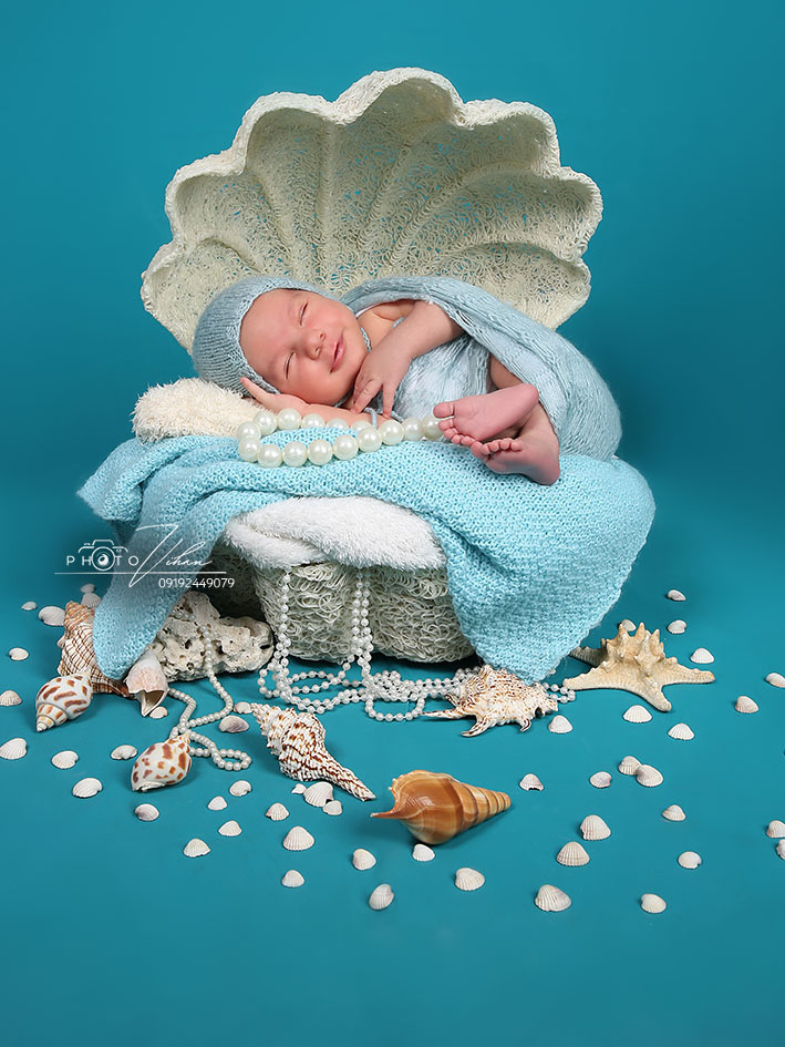 آتلیه نوزاد عکسهای دورپیچ نوزادی